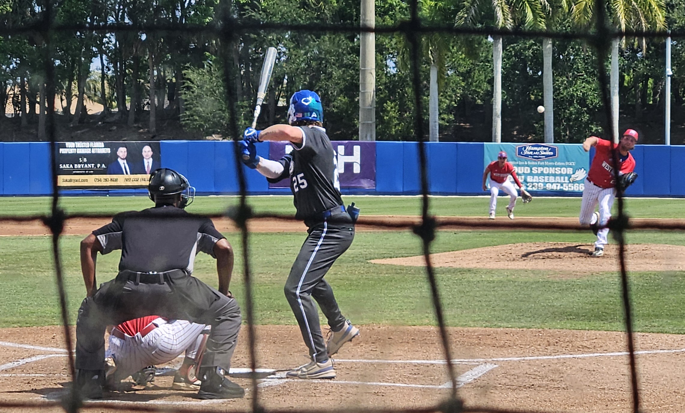 FGCU No. 25 Evan Dempsey waits on a pitch